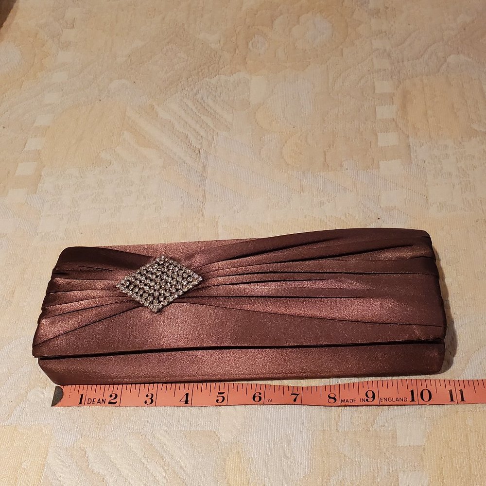 Sasha clutch satin-like fabric with broach decor; bronze color